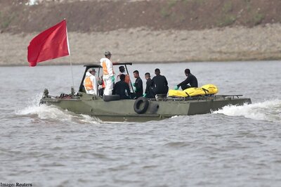 China ship disaster death toll jumps to 396, company says sorry