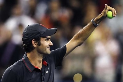 Federer wins in 1st round at Swiss Indoors
