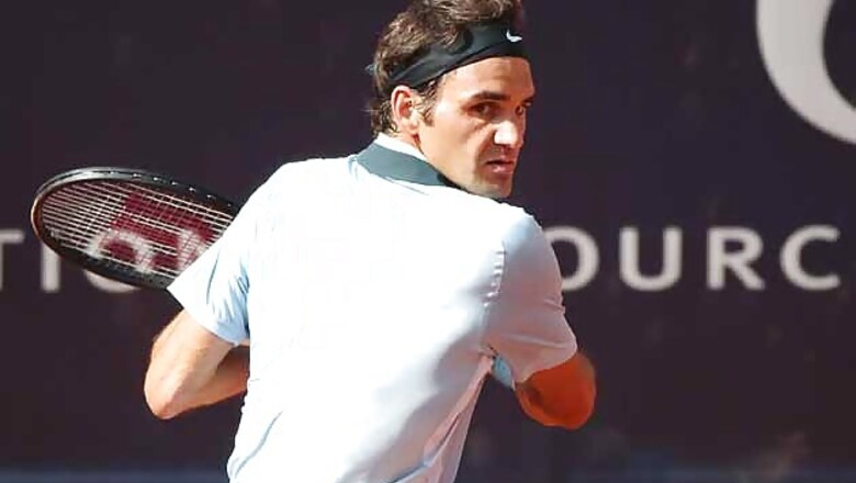 Federer, Haas reach Hamburg quarter-finals