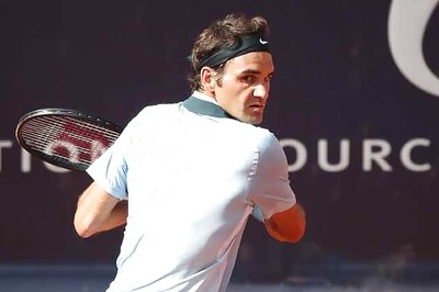 Federer, Haas reach Hamburg quarter-finals