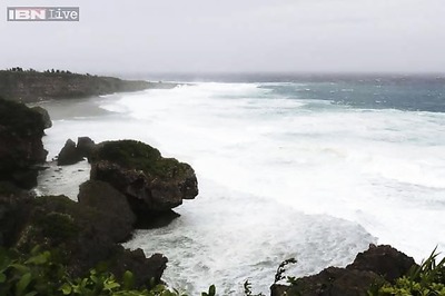45 dead in China rains, red alert issued for typhoon Rammasun