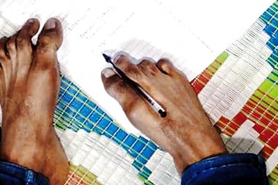 Disability no handicap for this 17-year-old law aspirant, uses his toes to write exams