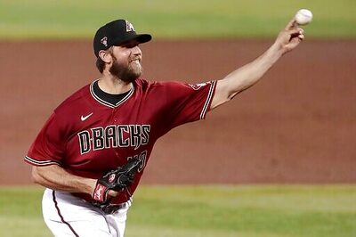 LEADING OFF: Bigger playoffs, new Texas park, Dbacks' MadBum