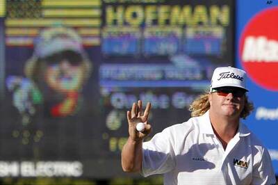 Hoffman wins Deutsche Bank, Tiger still No. 1