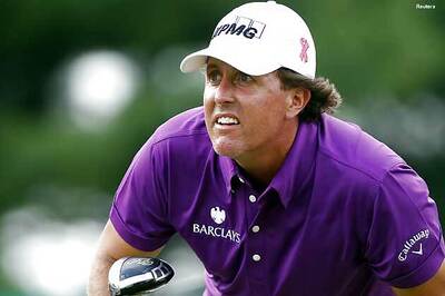 Mickelson, Singh share BMW Championship lead