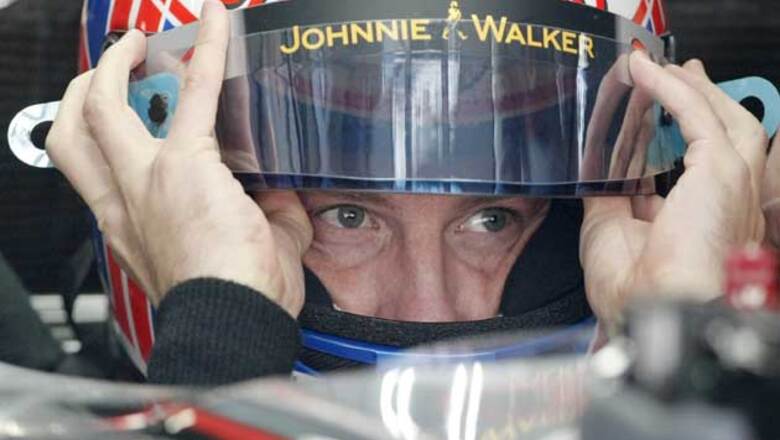 Button takes pole position for Belgian GP