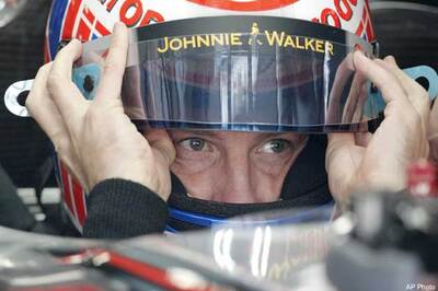 Button takes pole position for Belgian GP