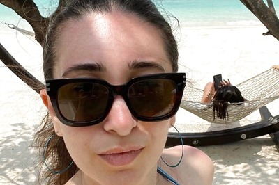 Karisma Kapoor Raises Heat In Bikini But Everyone Wants to Know Who Kareena Kapoor Is Stalking