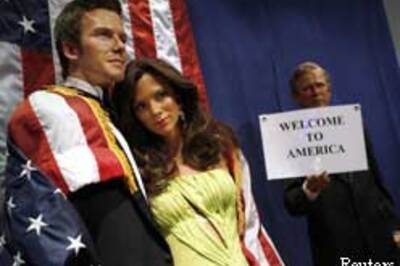 Bush welcomes wax Beckhams in US