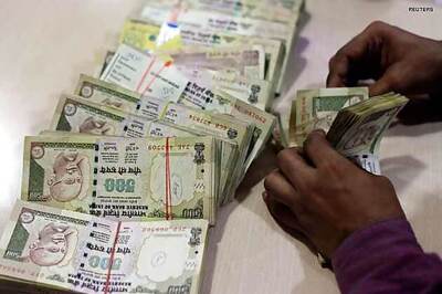 Rupee edges up against US dollar to end at 61.84