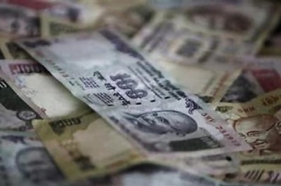 Rupee tumbles to biggest loss in a month, down 31 paisa vs US Dollar