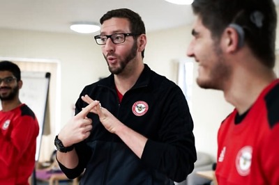 Football Coach Proves Deafness is No Hindrance to Career on Touchline