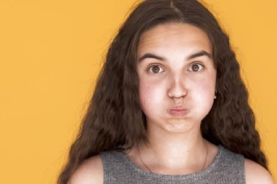 Is Stress To Blame For Your ‘Cortisol Face’? Here’s What Experts Say