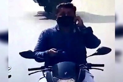 Watch Video: Biker Rides Hands Free With a Phone in Each Hand, Cops Issue Challan