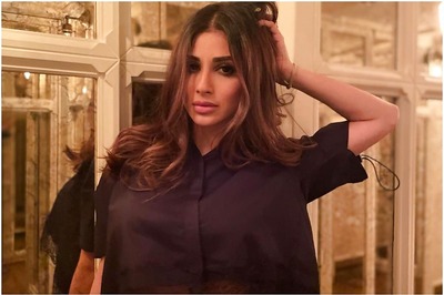 Mouni Roy Looks Mesmerising in Lacy Black Crop Top Posing in a Mirrored Hallway