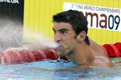 Phelps rebounds with world record in 200m butterfly