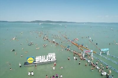 Thousands dive into balmy Lake Balaton in Hungary for swimming contest
