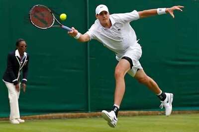 John Isner beats Ryan Harrison in opening round at Newport