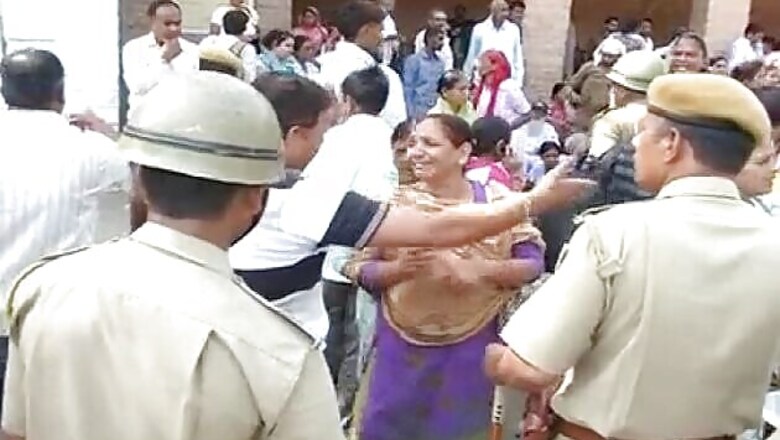 Asaram supporters rally outside Jodhpur jail to catch a glimpse of him