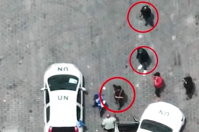 Israel Releases Video Of Armed Men Near UN-marked Vehicles In Gaza