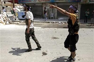 Assad forces pound Aleppo, declare Damascus victory