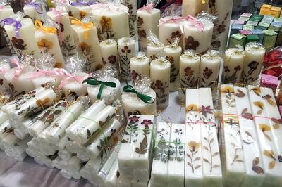 Get Your Home Festive Ready With Scented Candles and Colourful Cushions