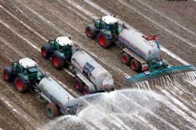 Europe's farmers dump milk to protest low prices