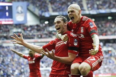 Carroll header sends Liverpool into FA Cup final