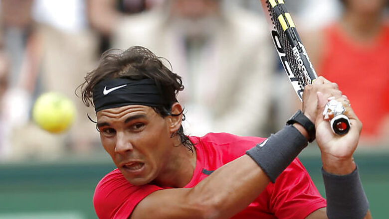Murray fights pain, Nadal wins easily