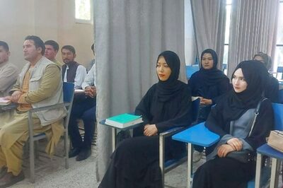 A Curtain Divides Male, Female Students as Universities in Afghanistan Reopen