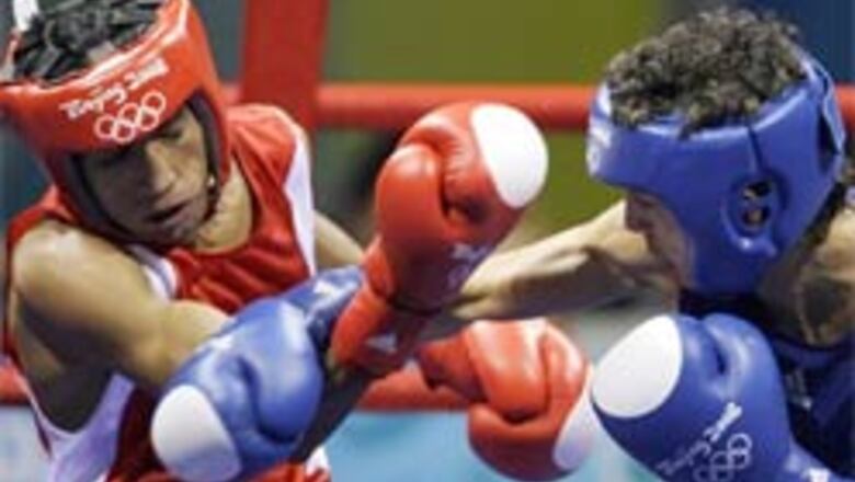 Jitender punches his way into flyweight pre-quarters