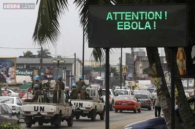 Liberia fights Ebola in capital, West Africa toll tops 1,200