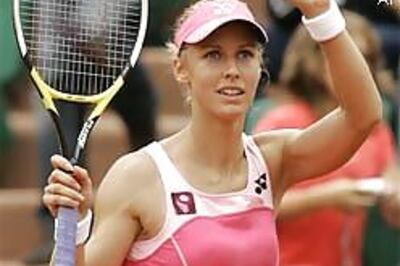 Sharapova leads Russian charge, Ferrer wins dogfight