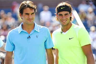 Federer, Clijsters lead parade of champions