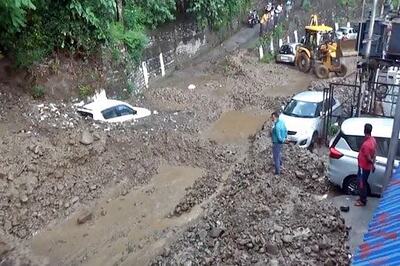 Vehicles Submerge in Sinkhole as Heavy Rain Leads to Waterlogging in Himachal Pradesh