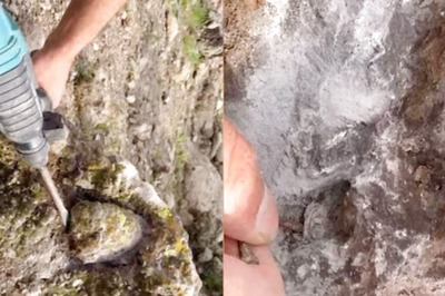 Watch: Man Finds Gold Coins After Drilling A Rock