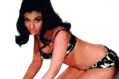 No, Mallika, you were not the first to kiss on-screen