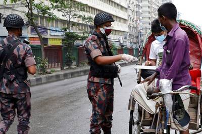 Bangladeshis Rush Back to Work as Factories Reopen Despite Coronavirus Surge