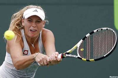 Injury ends Wozniacki's title bid at Family Circle