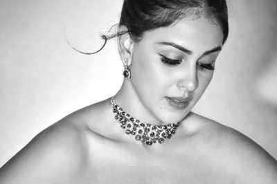 Genelia Deshmukh Stuns In All-black Feather Maxi Dress, Husband Riteish Reacts