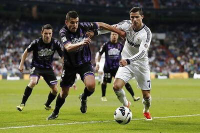 Real Madrid delay Barcelona's title hopes