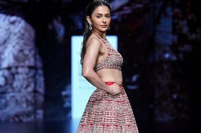 Rakul Preet Singh Shines Bright In A Red And Gold Classic Lehenga By Bhumika Sharma At Lakmé Fashion Week x FDCI