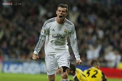 Bale's double upstaged by Ronaldo hat-trick against Sevilla