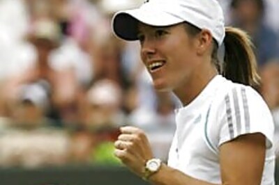 Henin-Hardenne dives into the  semis