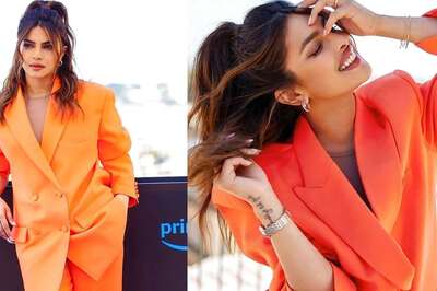 Priyanka Chopra Jonas, In Orange Pantsuit, Promotes Citadel With Richard Madden