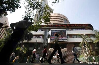 Sensex jumps 200 points; Nifty above 8,200 on monsoon cheer