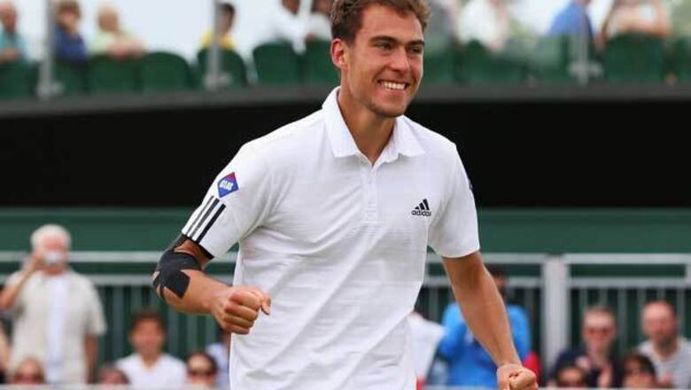 Two Poland players advance to Wimbledon quarters