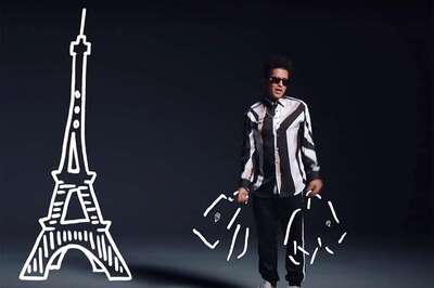 Bruno Mars Gifts Personalised Jersey to Former First Lady Michelle Obama