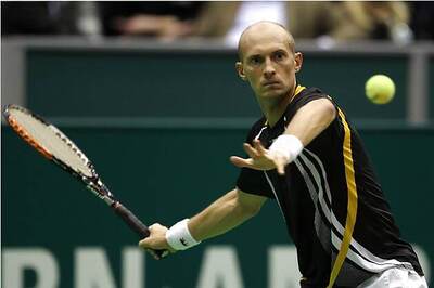 Davydenko, Monfils reach quarterfinals at Qatar Open