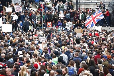 The Latest: India Sees New Record Jump, Eases Restrictions